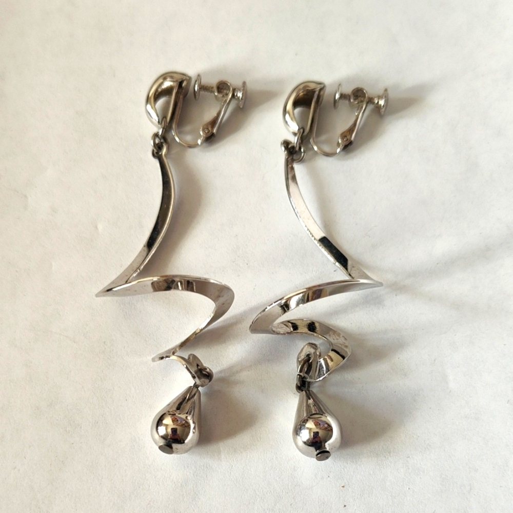 Elegant Silver Spiral Drop Clip Earrings